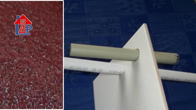 To huller i fliserne lavet med sandpapir