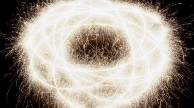 Abstrakt billede af en roterende elektron